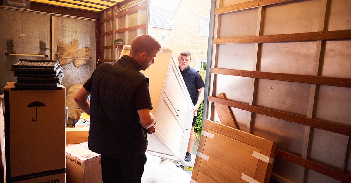 Movers loading a box truck